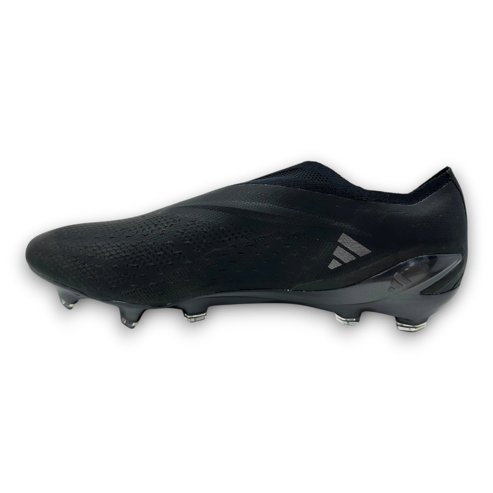 SHOPTCRAMPONS Adidas X SpeedPortal+ FG Nightstrike football boots in all black with SpeedSkin compression upper.
